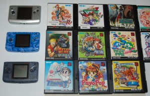 3 Neo Geo Pocket consoles and their games